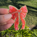 Gold and red star bows